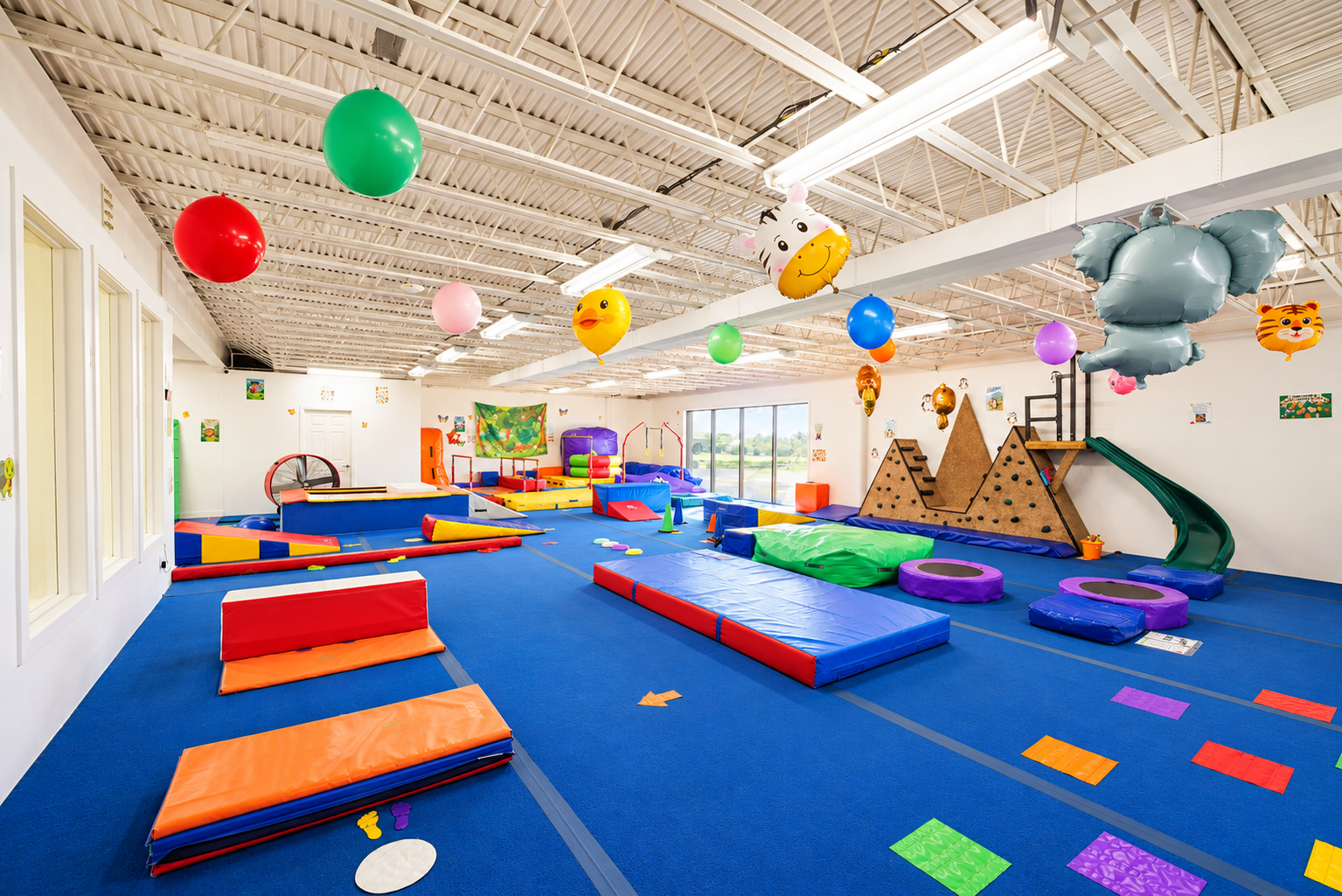 Colorful low equipment and mats in the preschool room